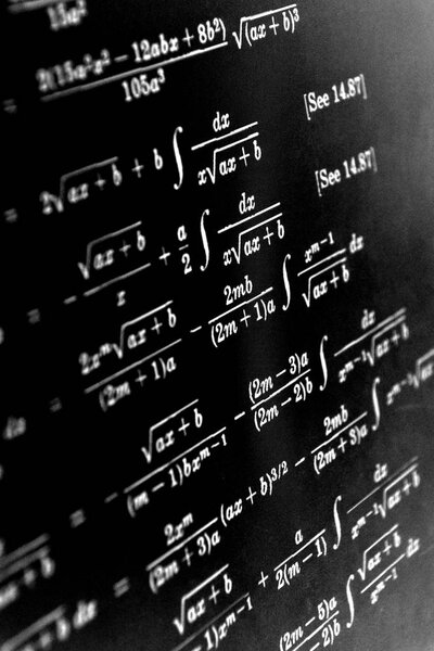 Large number of mathematical formulas on a black background
