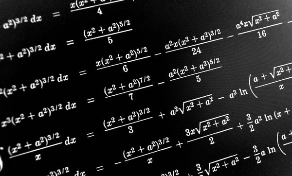 Large number of mathematical formulas on a black background