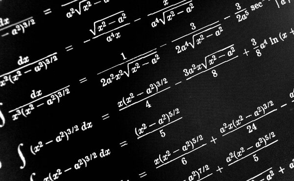 Large number of mathematical formulas on a black background