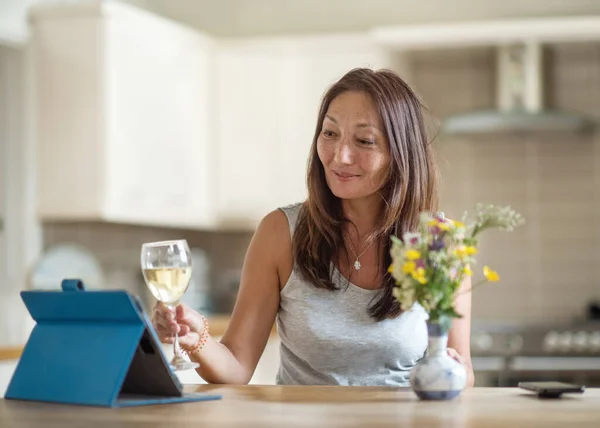 Asian woman meeting and talking to friends on the internet