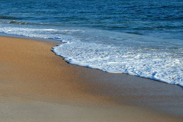 Ocean surf waves on the beach St. Augustine, Florida