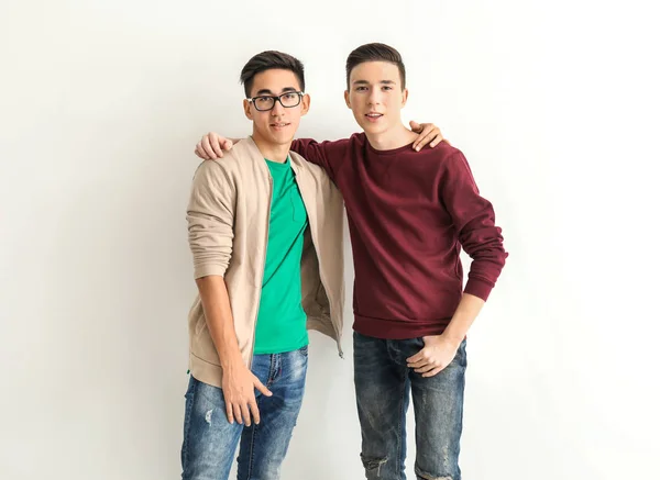 Cool teenage boys on white background — Stock Photo, Image