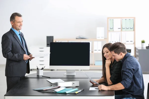 Young couple at notary public office