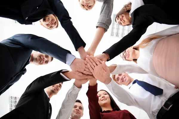 People putting hands together in office. Unity concept — Stock Photo, Image