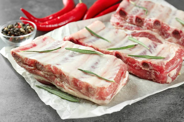 Waxed Paper Fresh Raw Pork Ribs Kitchen Table Closeup — Stock Photo, Image