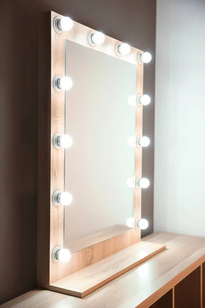 Workplace of professional makeup artist with large mirror — Stock Photo, Image
