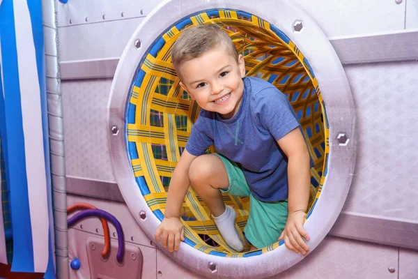 Cute Boy Playing Entertainment Center — Stock Photo, Image