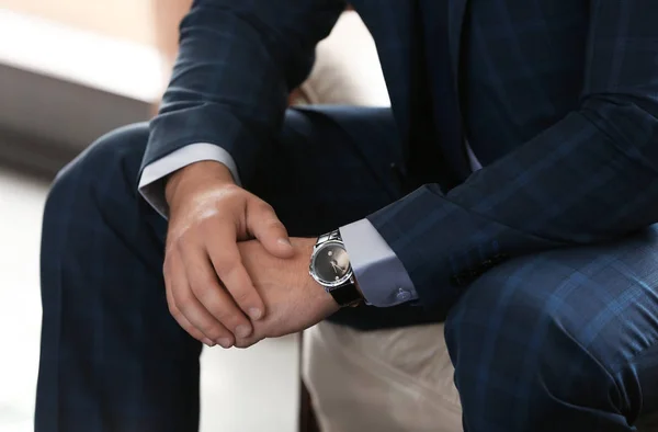 Young Man Elegant Suit Sitting Sofa Indoors — Stock Photo, Image