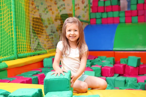 Cute Girl Playing Entertainment Center — Stock Photo, Image