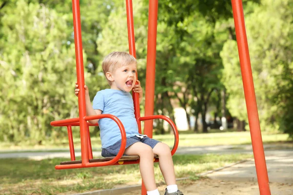 Cute Little Boy Playing Swings Park — Stock Photo, Image