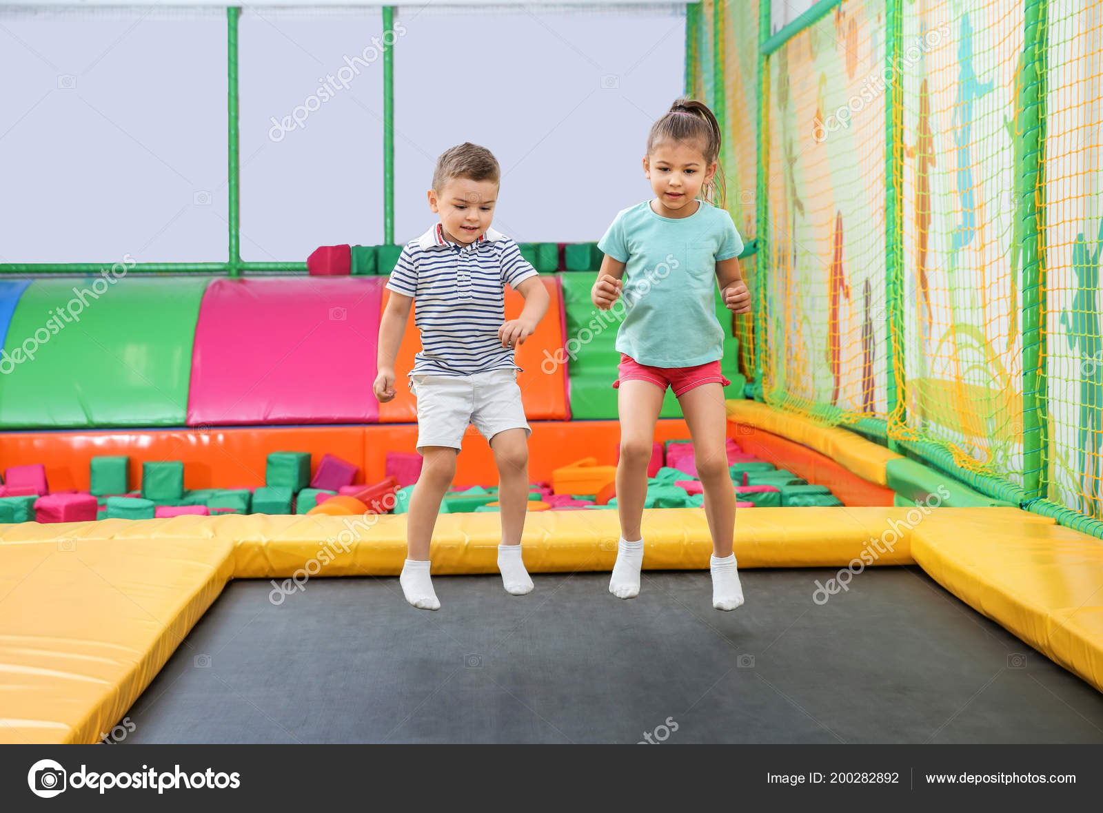Cute Children Jumping Trampoline Entertainment Center — Stock Photo
