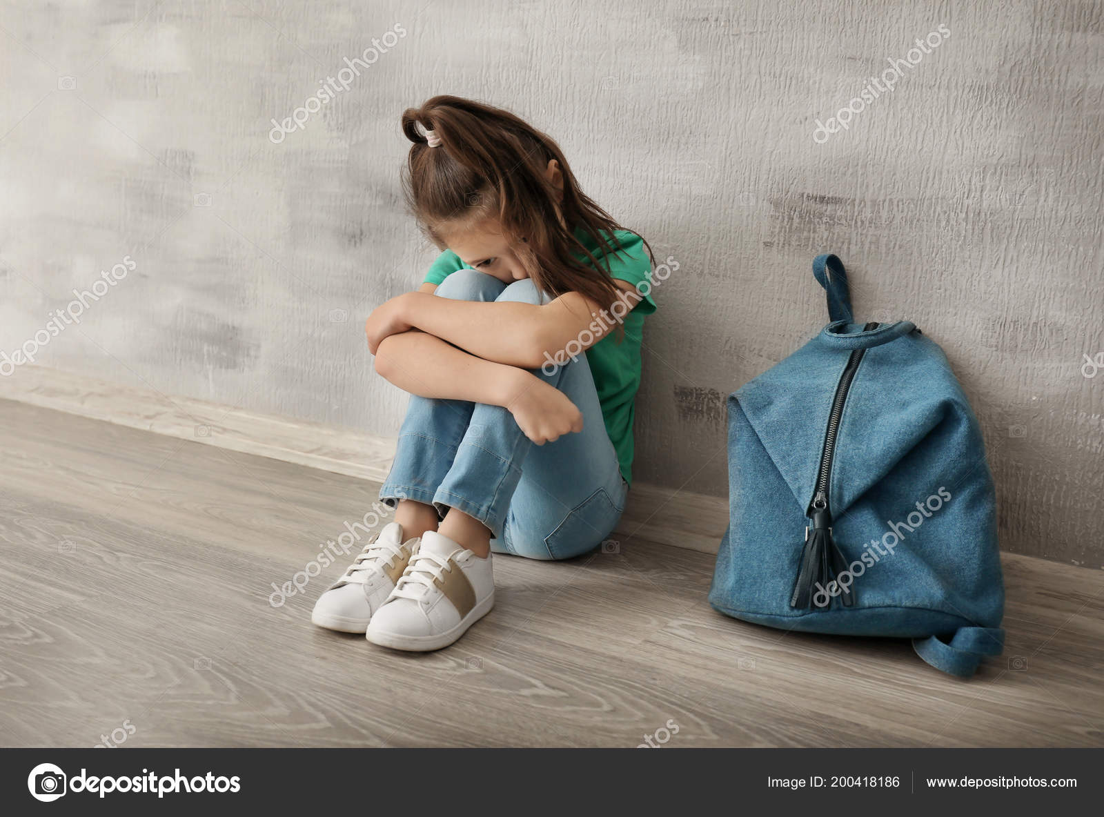 to manage Hypocrite gown Upset Little Girl Backpack Sitting Floor Indoors Bullying School Stock  Photo by ©belchonock 200418186