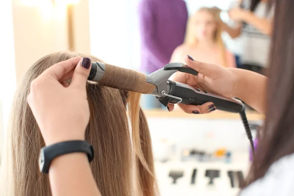 Professional hairdresser working with client in salon. Apprenticeship concept — Stock Photo, Image