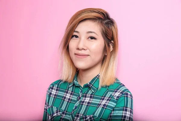 Portrait of beautiful Asian woman on color background — Stock Photo, Image