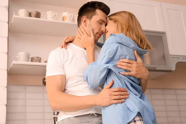 Beautiful Young Couple Hugging Kitchen — Stock Photo, Image