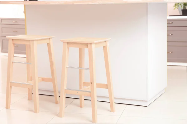 Modern counter with stools in kitchen