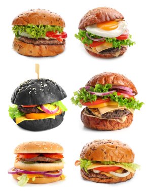 Beyaz arka planda değişik lezzetli hamburgerler.