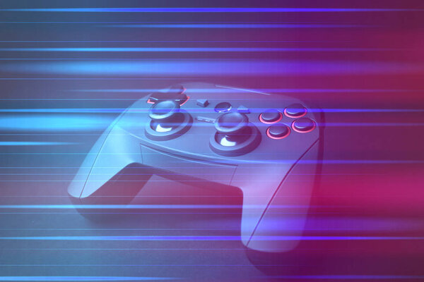 Video game controller on dark background, colorful effect. Leisure and entertainment