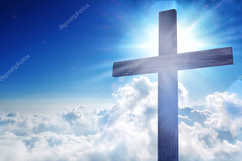 Wooden cross on sky background. Christian religion