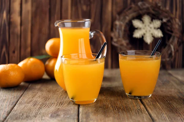 Fresh citrus juice in glasses on table — Stock Photo, Image