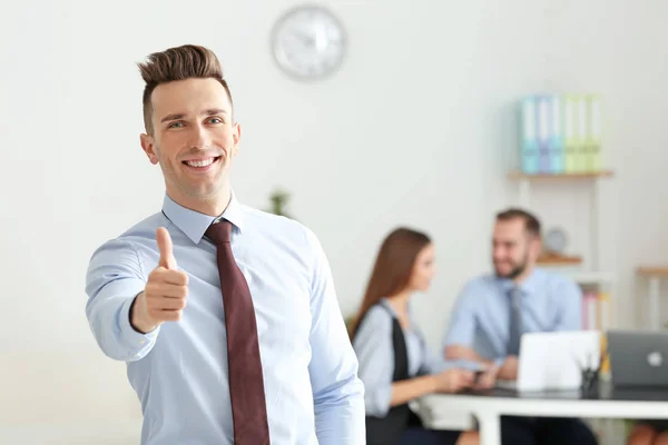 Young managers engaged in work on business project in office — Stock Photo, Image