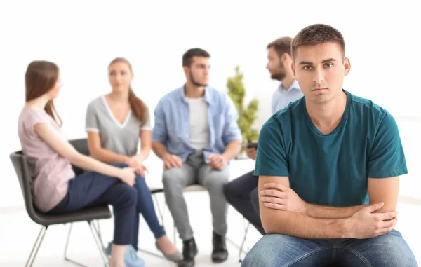 Young men putting fists together, indoors. Unity concept — Stock Photo, Image