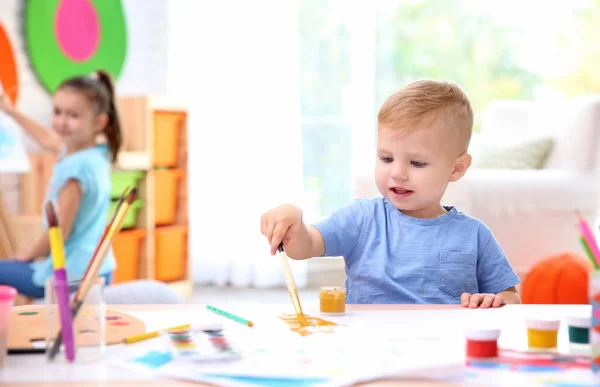 Little Boy Blurred Girl Painting Indoors — Stock Photo, Image