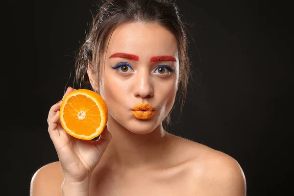 Young Woman Dyed Eyebrows Half Orange Black Background — Stock Photo, Image