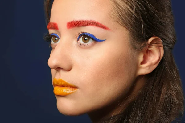 Young Woman Dyed Eyebrows Creative Makeup Dark Background Closeup - Stock-foto