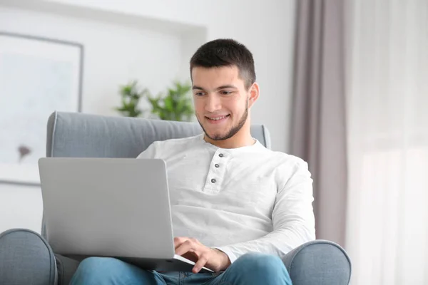 Young Man Using Modern Laptop Home — Stock Photo, Image