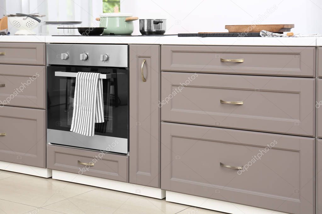 Modern kitchen furniture with electric stove