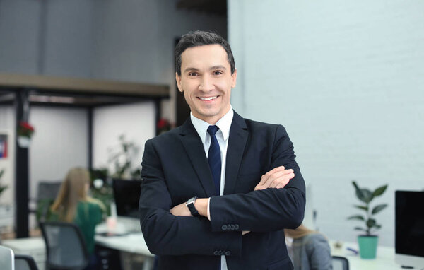 Young man in modern office. Small business owner