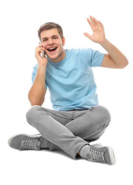 Привлекательный Молодой Человек Разговаривает Мобильному Телефону Белом Фоне — стоковое фото