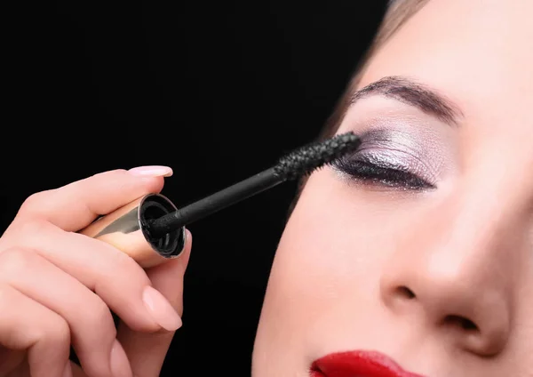 Beautiful Young Woman Eyelash Extensions Applying Mascara Black Background Closeup — Stock Photo, Image