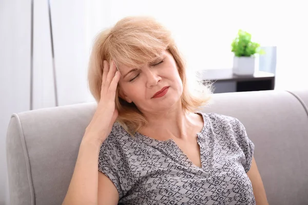 Mature Woman Suffering Headache Home — Stock Photo, Image