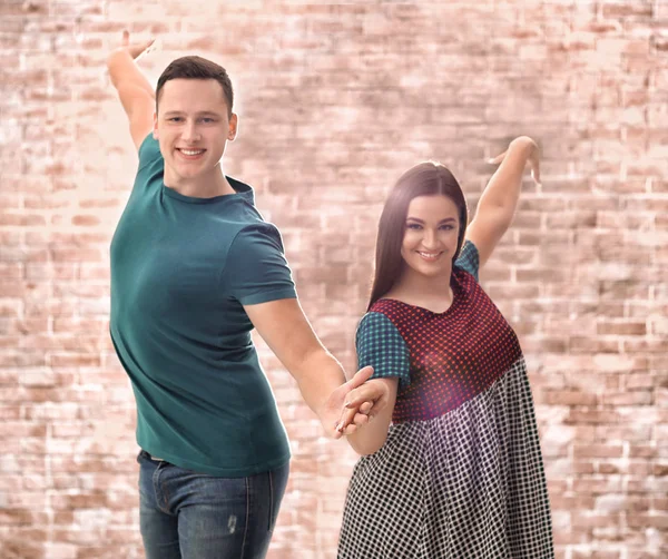 Happy Young Couple Dancing Brick Wall — Stock Photo, Image