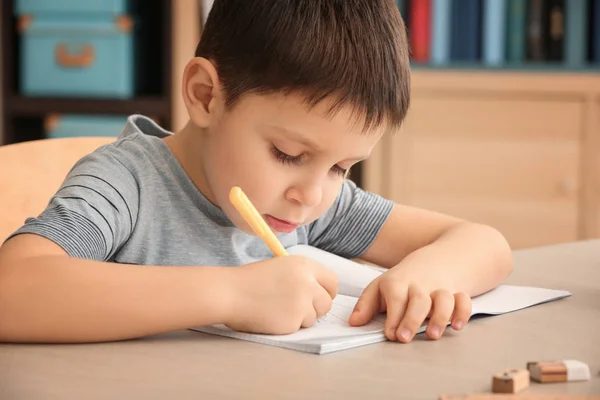 Cute Little Boy Doing Homework Indoors — Stock Photo, Image