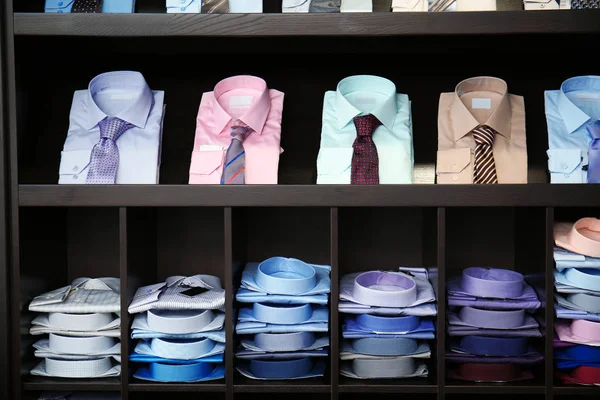 Assortment of classic shirts at menswear store