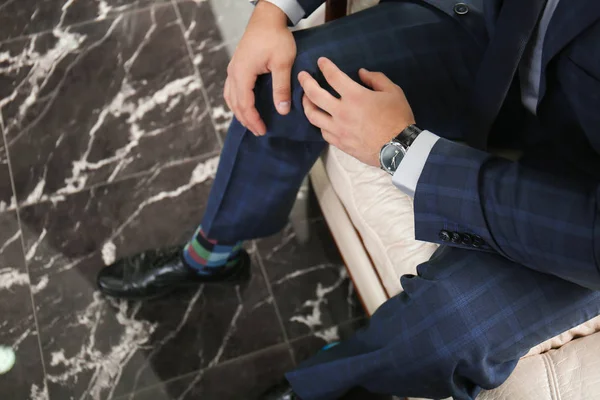 Young Man Elegant Suit Sitting Sofa Indoors — Stock Photo, Image