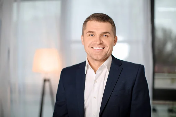 Mature man in elegant suit indoors