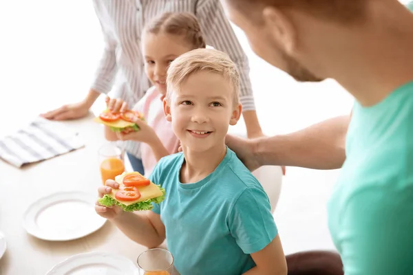 Little Boy Holding Tasty Toast Vegetables Cheese Indoors — Stock Photo, Image