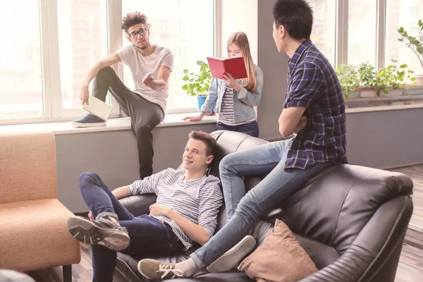 Students resting together in campus building — Stock Photo, Image