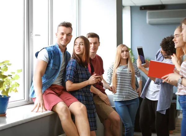 Students resting together in campus building — Stock Photo, Image