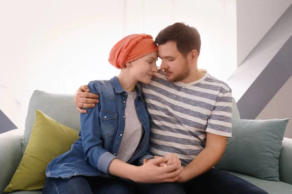 Young man visiting his wife with cancer indoors — Stock Photo, Image