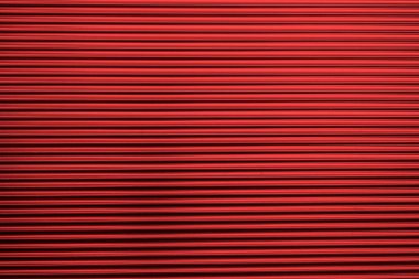 Oluklu metal arka plan metin için boş alan ile. Kırmızı dalgalı oluklu metal doku, kopya alanı