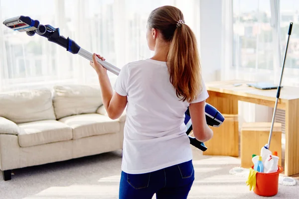 Portrait Young Woman White Shirt Jeans Holding Hands Wireless Vacuum — Stock Photo, Image