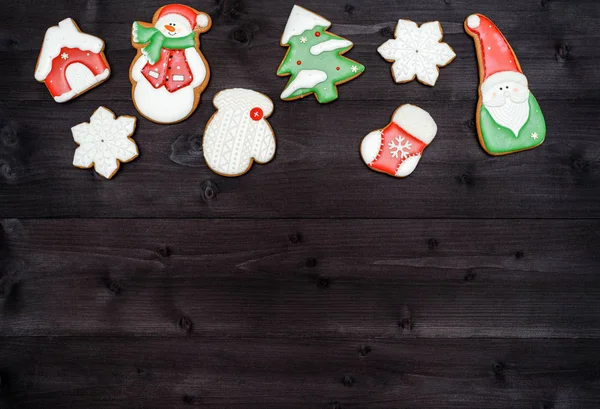 Tasty Homemade Gingerbread Cookies Icing Dark Wooden Table Top View — Stock Photo, Image