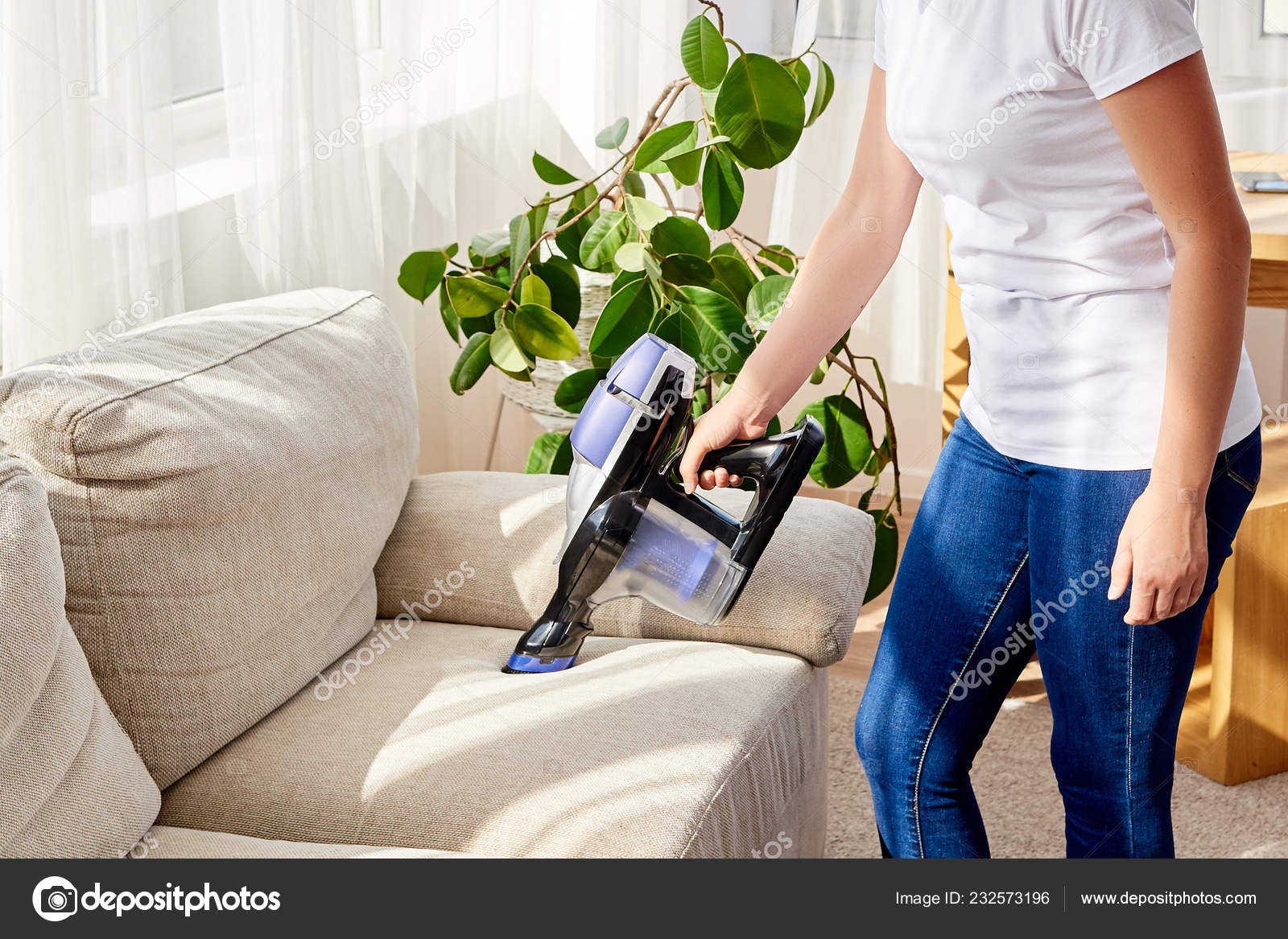 Close Young Woman White Shirt Jeans Cleaning Sofa Vacuum Cleaner Stock Photo By D Duda 232573196 Close Young Woman White Shirt Jeans, How To Clean Sofa At Home With Vacuum Cleaner