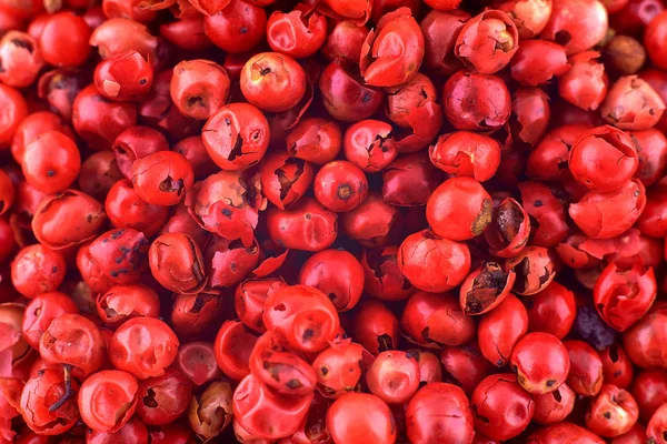 Pimenta rosa ervilhas textura de fundo, espaço de cópia, close-up. Topo v — Fotografia de Stock