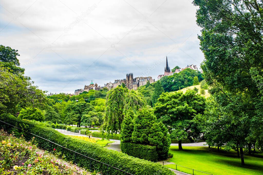 View of old Edinburgh, Scotland on a sunny day from Princes Street Gardens